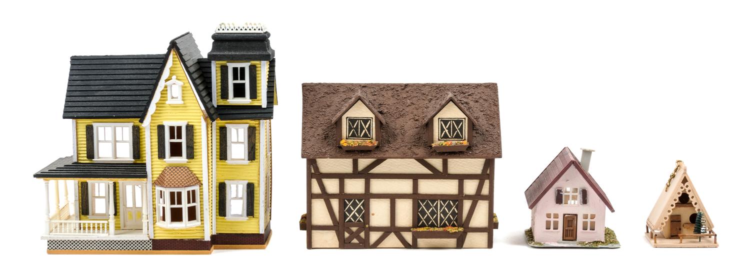 A Group of Four Miniature Houses Height of first 4 3/8 inches.