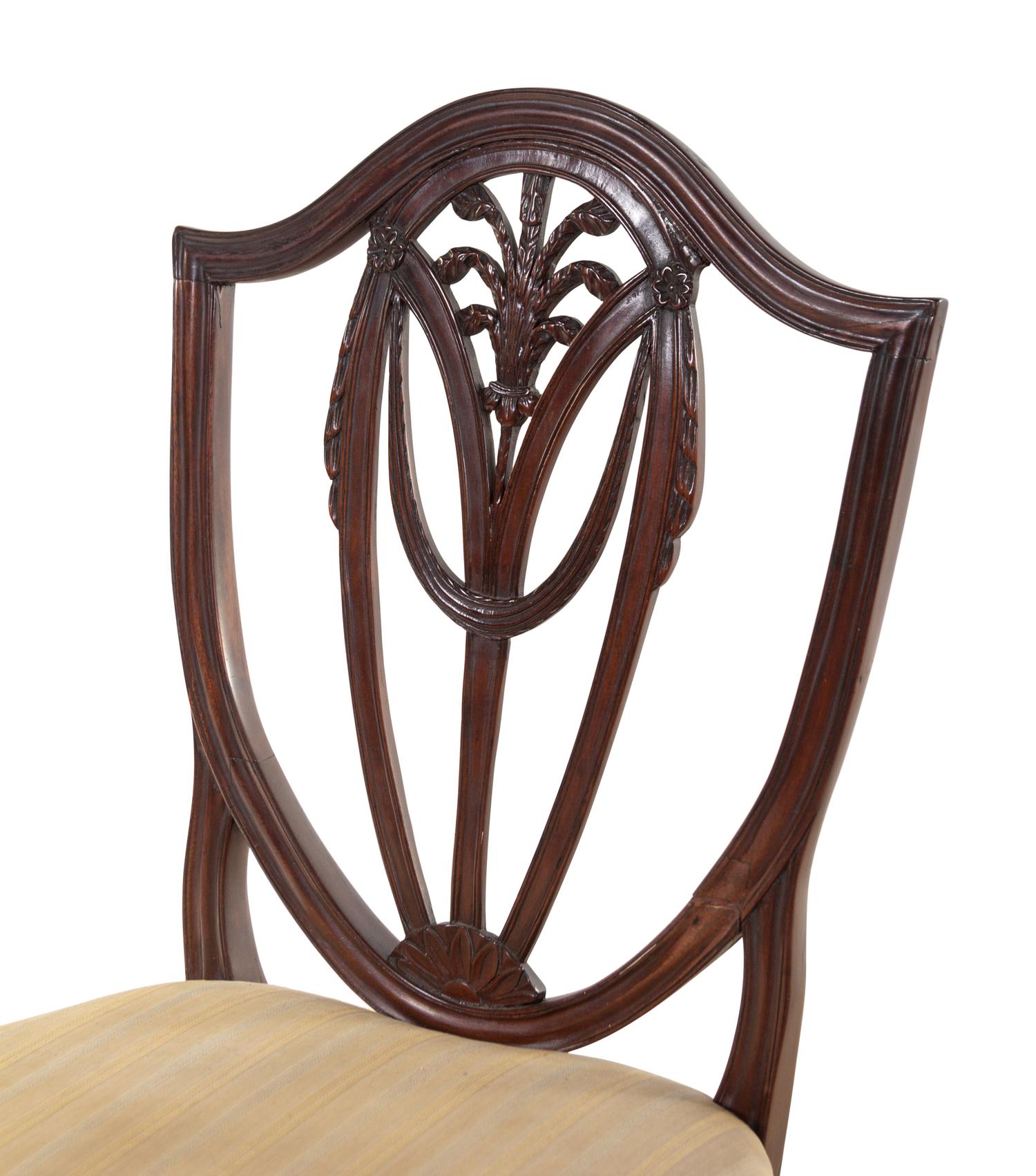 A Late George III Carved Mahogany Armchair and Side Chair