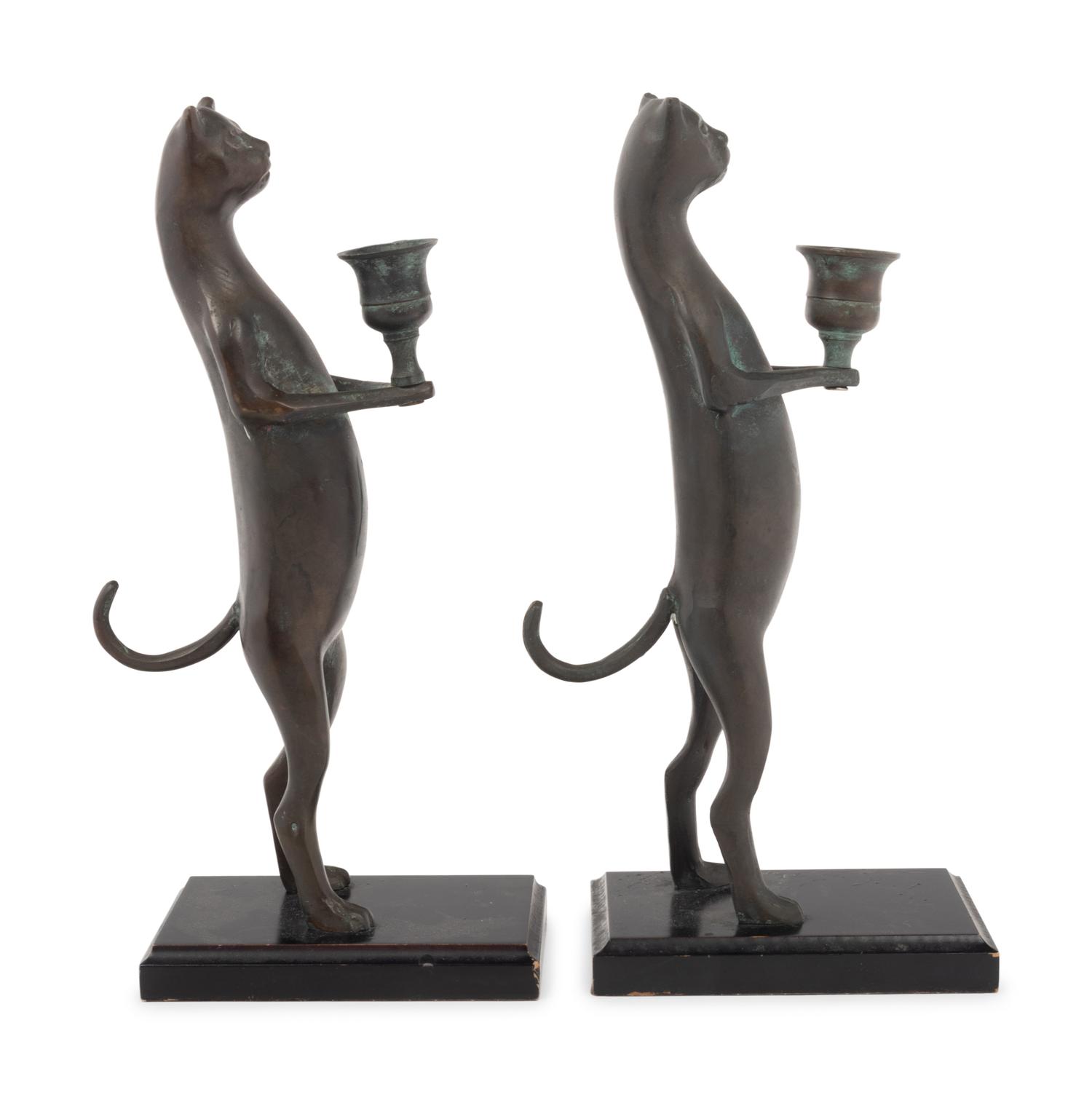 A Pair of Pewter Cat-Form Candlesticks