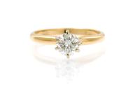 A 14 Karat Yellow Gold and Diamond Solitaire Ring, 1.70 dwts.
