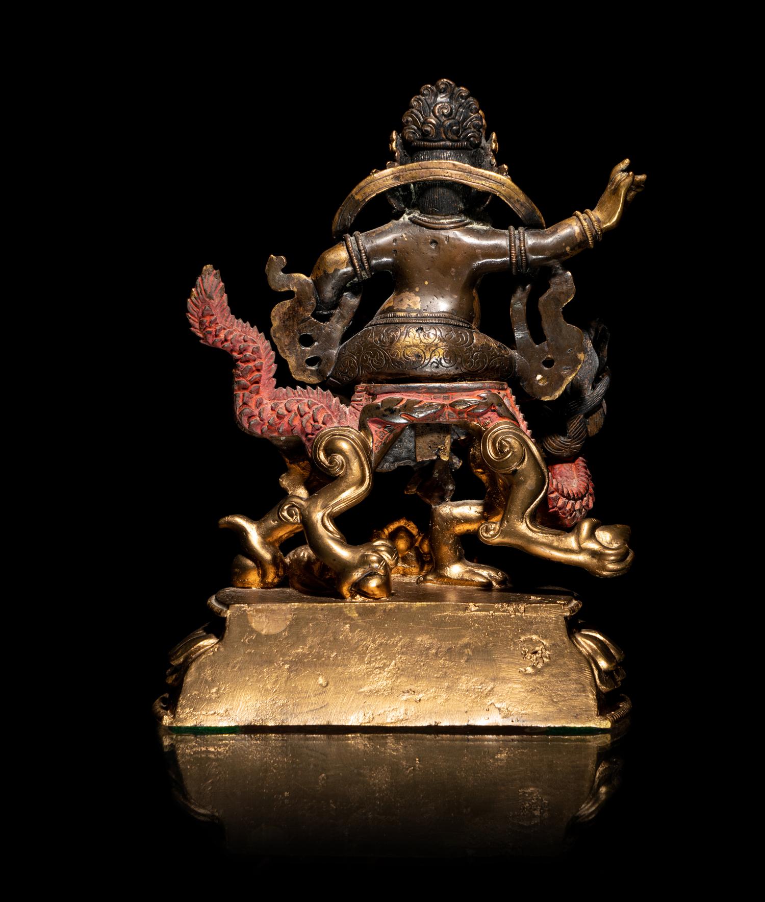 A Sino-Tibetan Gilt Bronze Figure of Kubera
