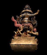 A Sino-Tibetan Gilt Bronze Figure of Kubera