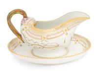 A Royal Copenhagen Flora Danica Porcelain Sauce Boat with Attached Underplate