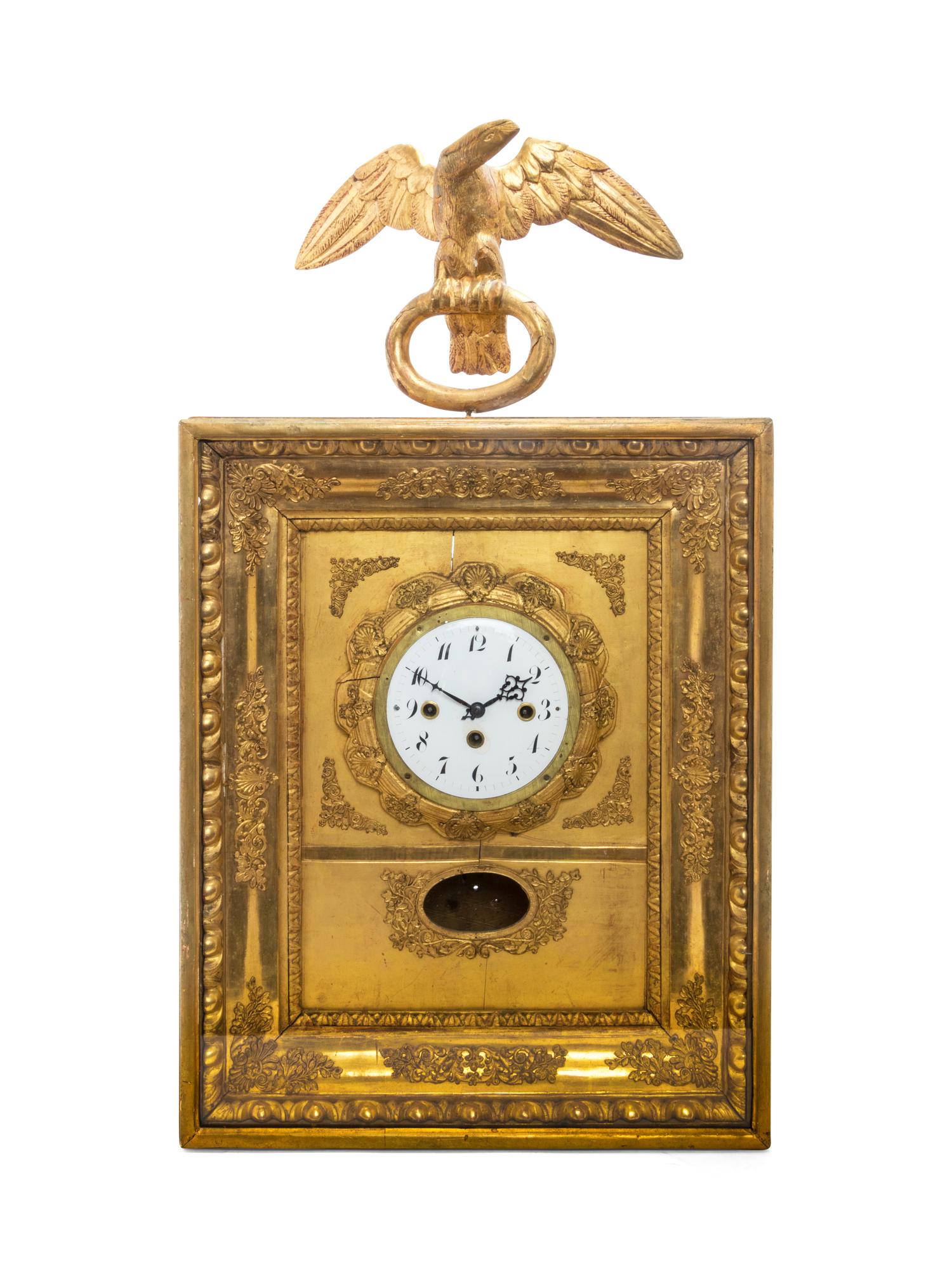 An Empire Giltwood Wall Clock