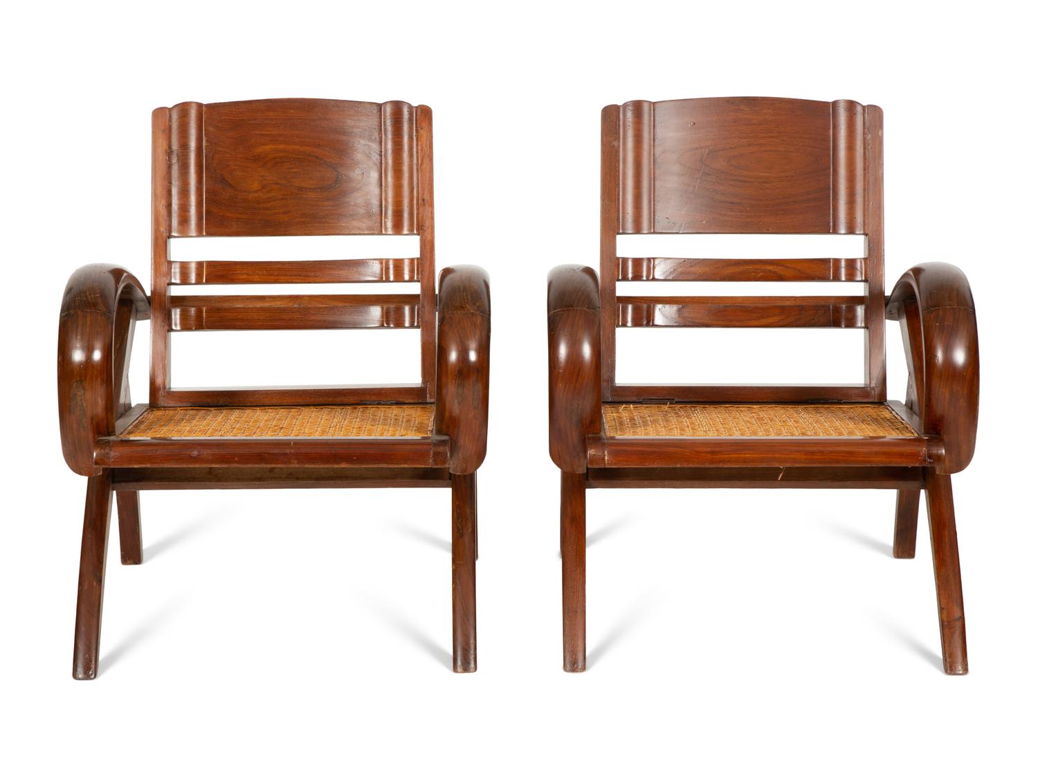 A Pair of Art Deco Walnut and Caned Folding Lounge Chairs