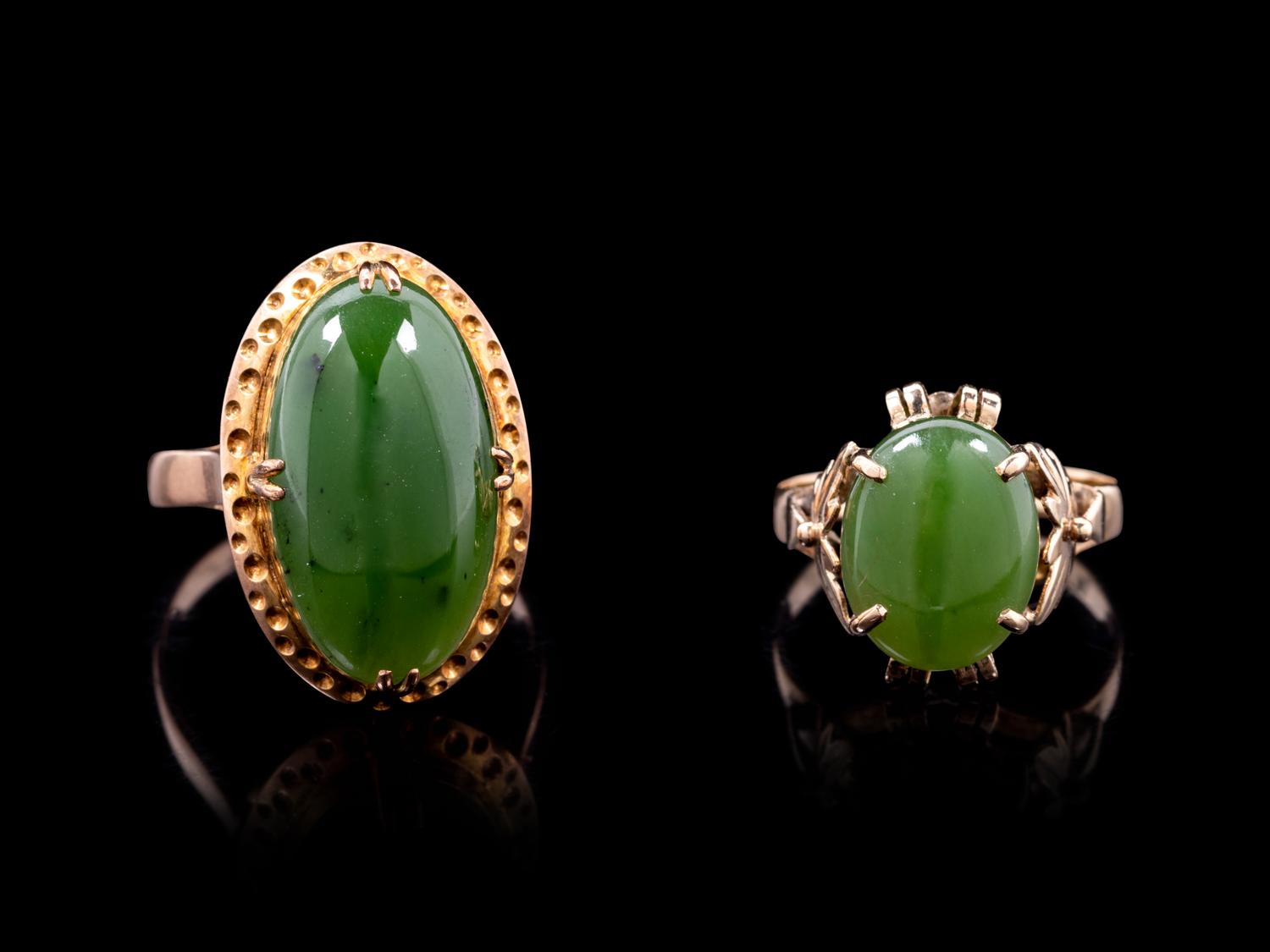 Two Chinese Spinach Jade and 18K Yellow Gold Mounted Rings