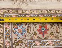 A Silk and Metallic Thread Rug