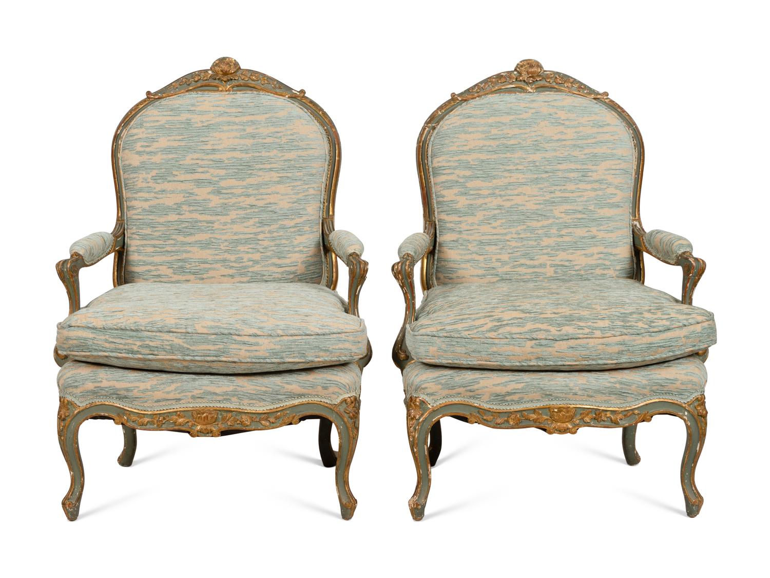 A Pair of Louis XV Style Green-Painted and Parcel Gilt Fauteuils