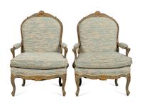 A Pair of Louis XV Style Green-Painted and Parcel Gilt Fauteuils