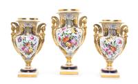 A Coalport Porcelain Three-Piece Garniture, Height of tallest 10 inches.