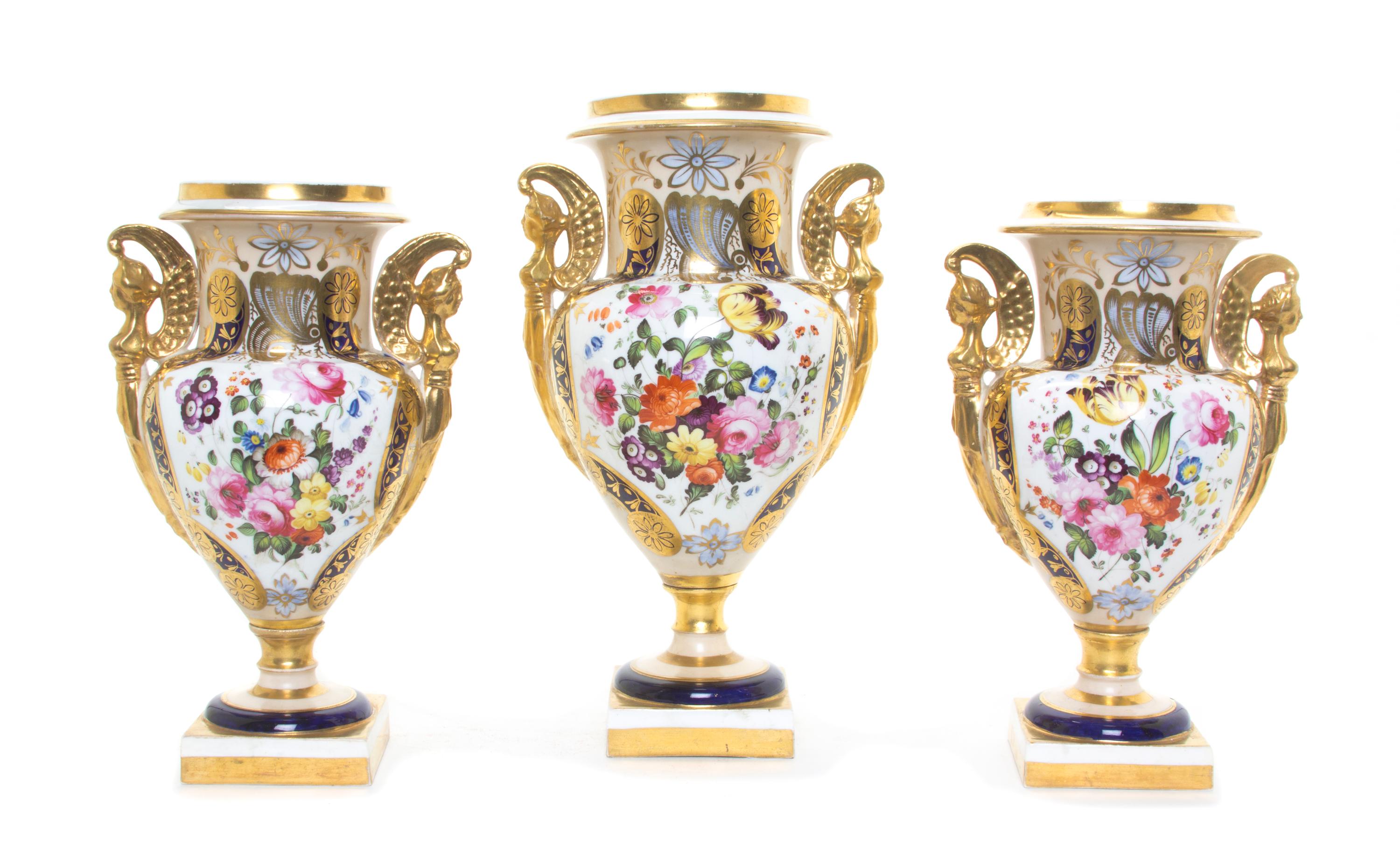 A Coalport Porcelain Three-Piece Garniture, Height of tallest 10 inches.