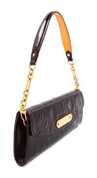 A Louis Vuitton Maroon Vernis Monogram Sunset Boulevard Bag, 4.5" H x 9.25" W x 1.25" D"; Shoulder drop: 7".