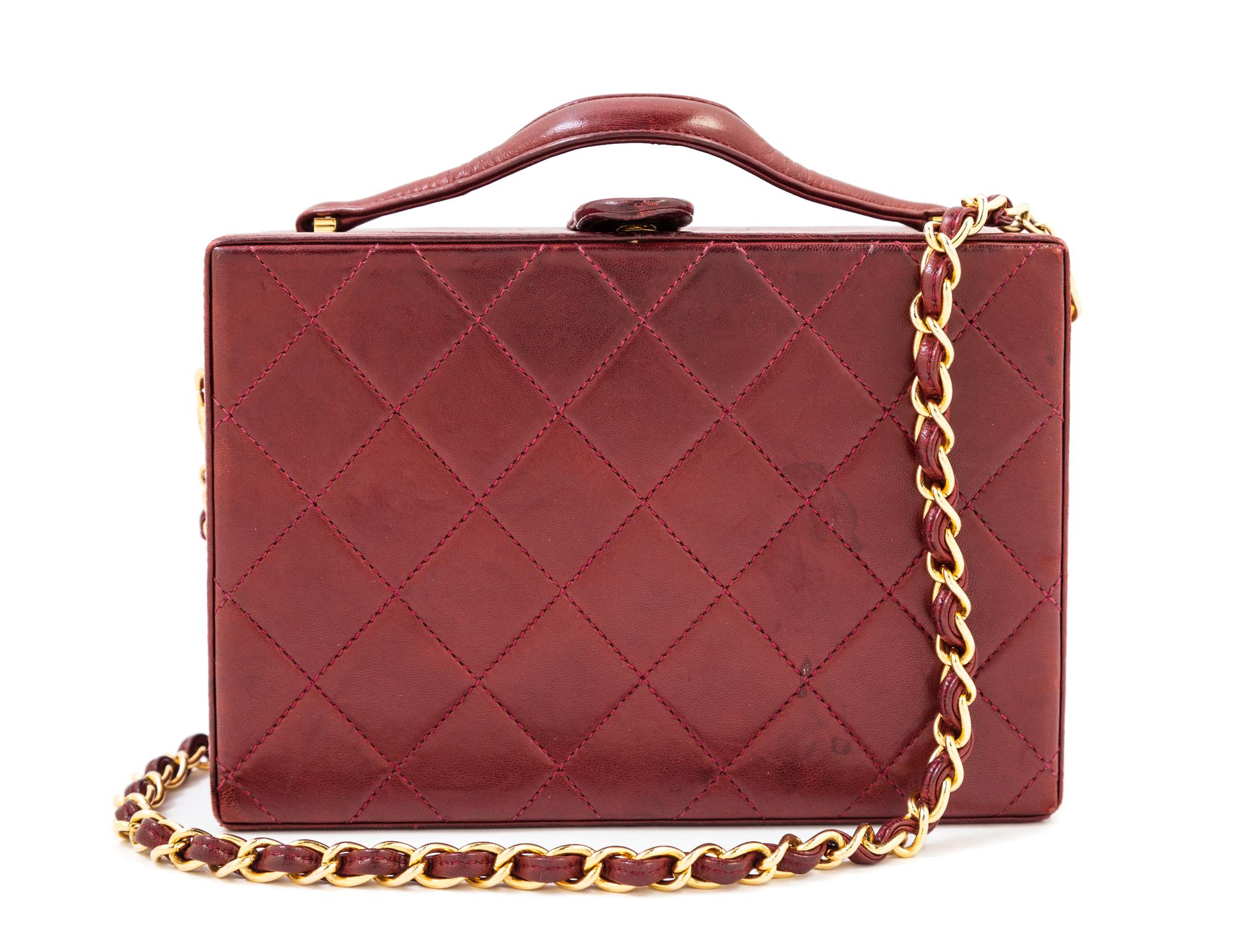 A Chanel Burgundy Lambskin Quilted Box Bag, 7.5" x 5.25" x 2.5"; Strap drop: 18".