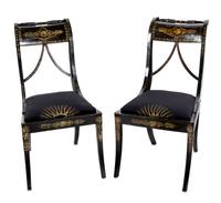 A Pair of Regency Ebonized and Parcel-Gilt Side Chairs Height 33 inches.