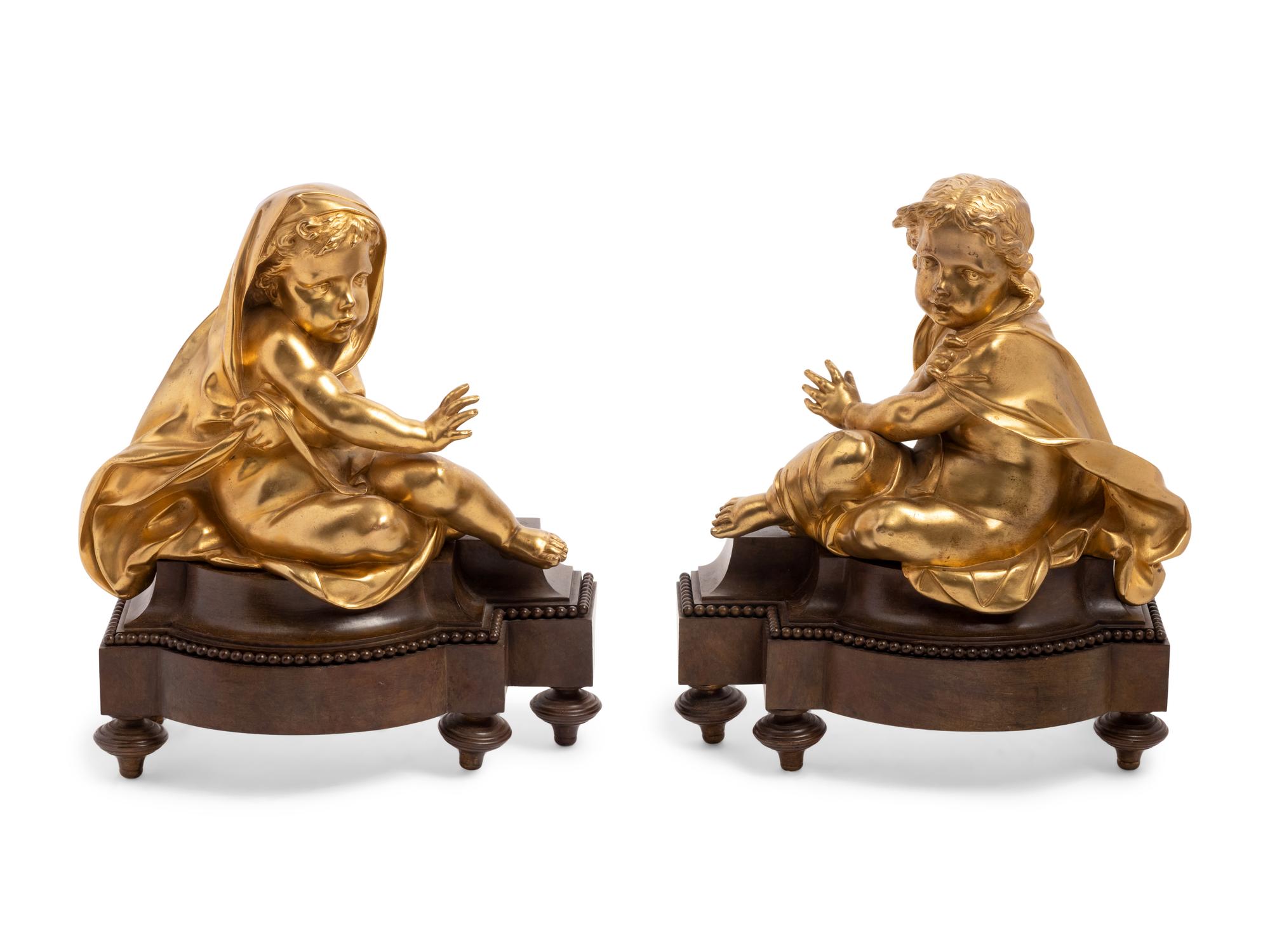 A Pair of French Gilt and Patinated Bronze Figural Chenets