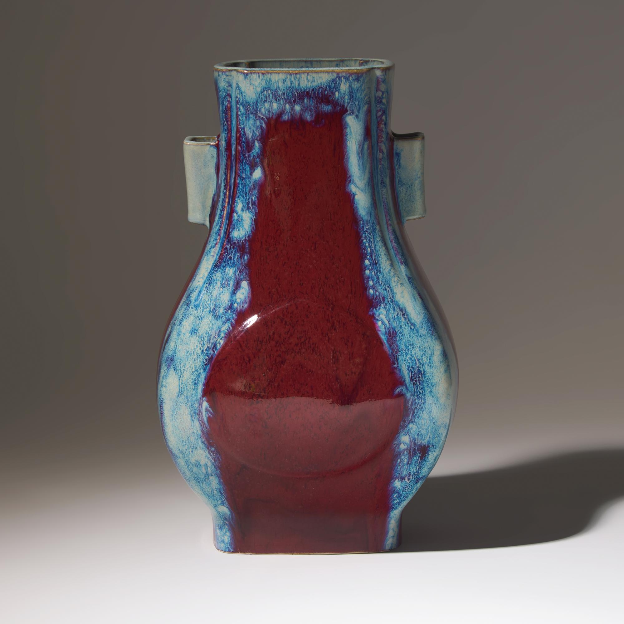 A Chinese Flambe-Glazed Vase Fanghu, Qianlong Mark and of the Period — 清乾隆 窯變釉杏圓貫耳方瓶