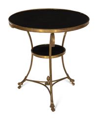 A French Empire Style Gilt Bronze and Black Granite Gueridon Table