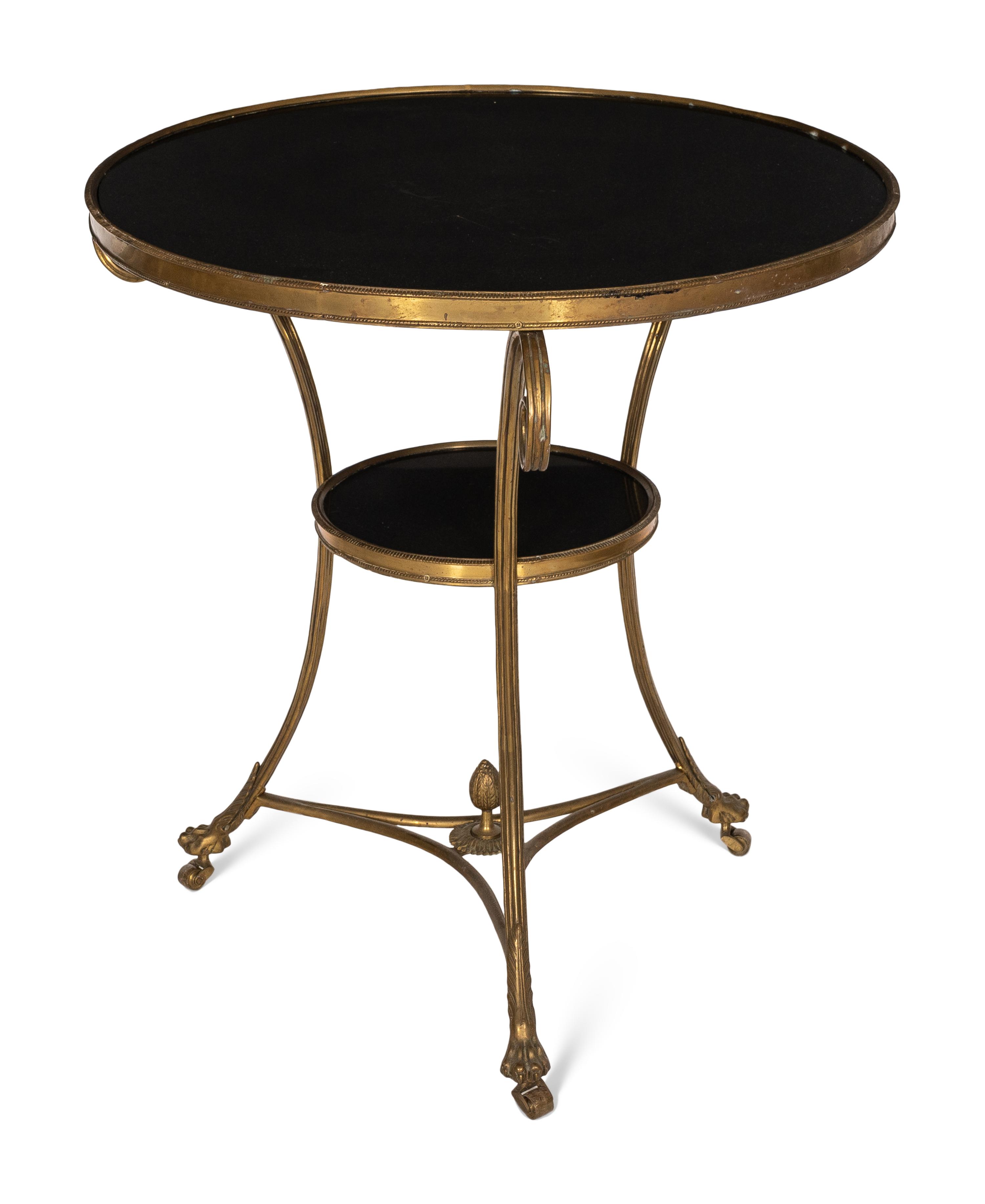 A French Empire Style Gilt Bronze and Black Granite Gueridon Table