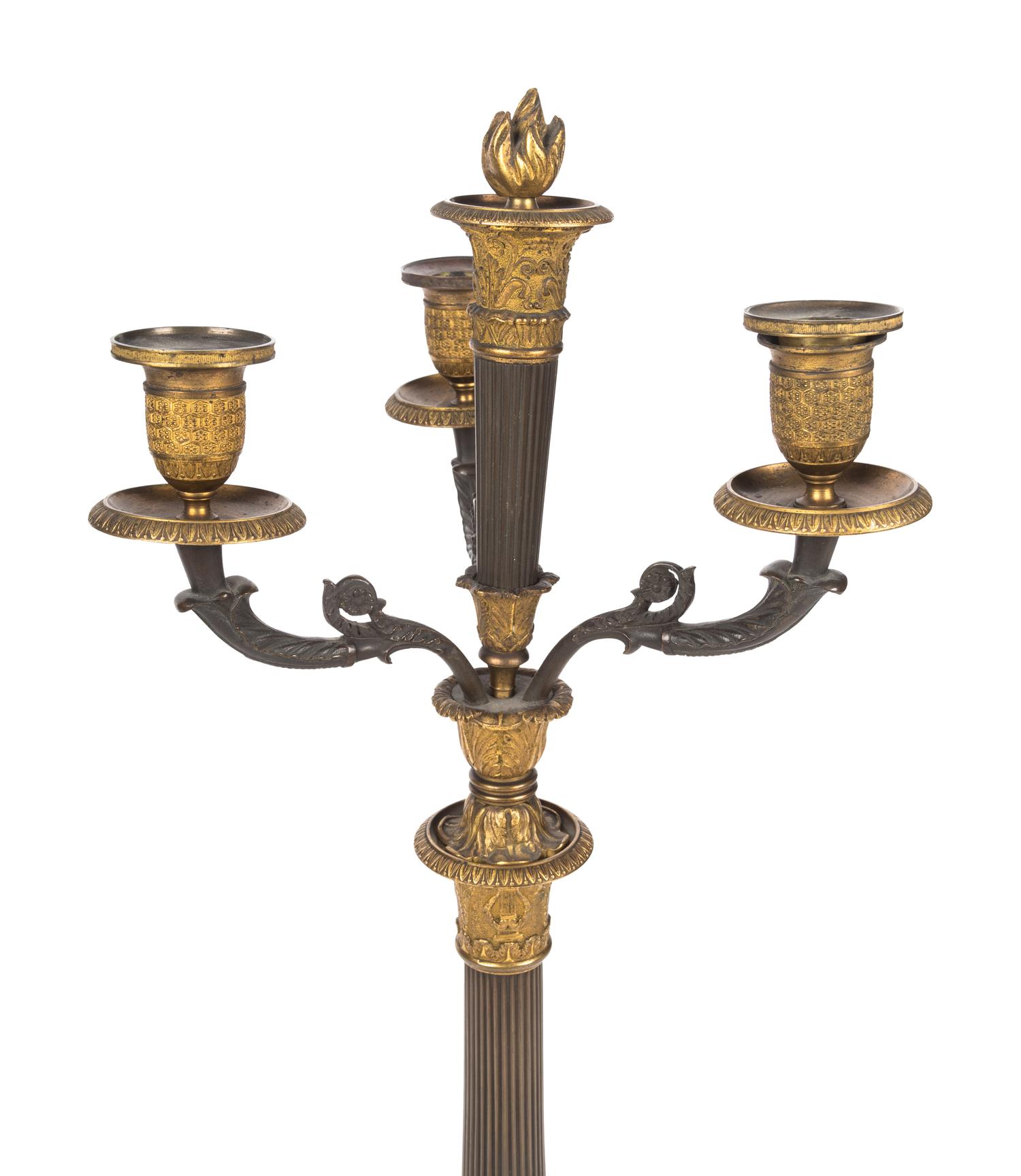 A Pair of Louis Philippe Patinated and Gilt Bronze Three-Light Candelabra