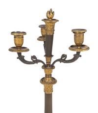 A Pair of Louis Philippe Patinated and Gilt Bronze Three-Light Candelabra