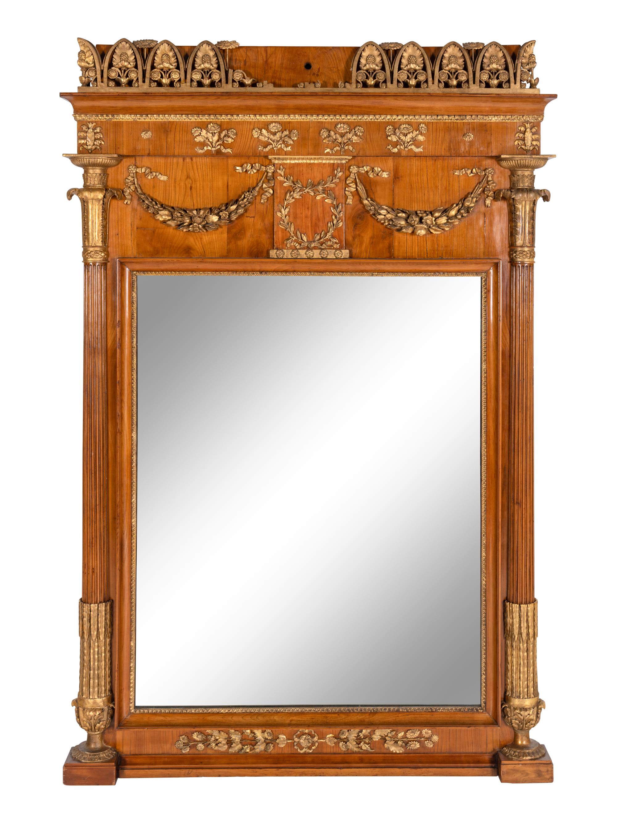 An Empire Style Parcel-Gilt Mahogany Mirror