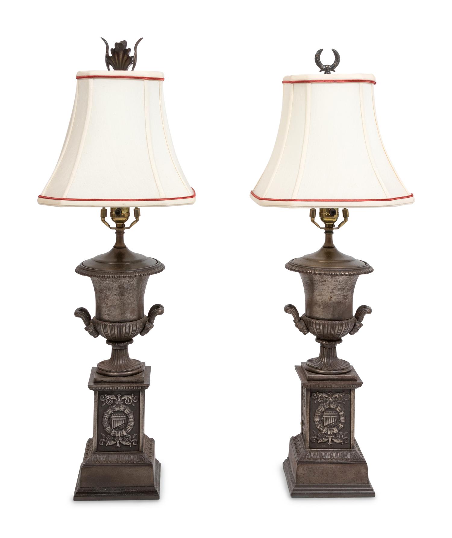 A Pair of Cast Iron Urns Mounted as Lamps