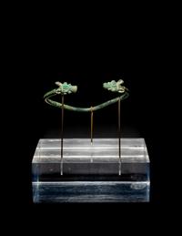 An Amlash or Luristan Bronze Bracelet with Animal Finials