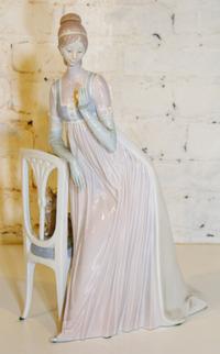 A Lladro Figure. Height 19 inches.