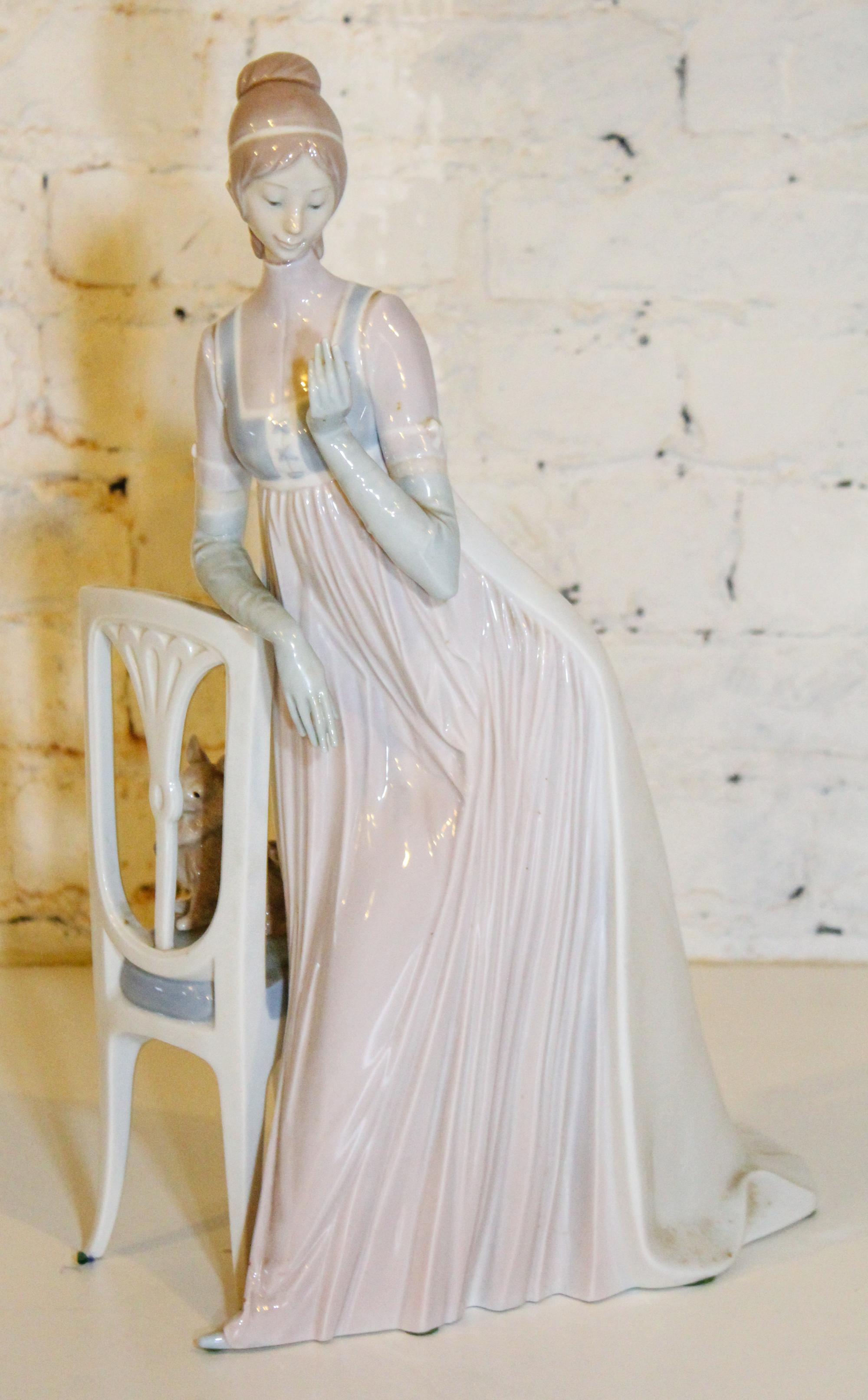 A Lladro Figure. Height 19 inches.