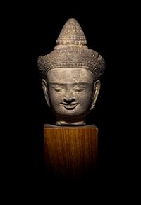 A Khmer Sandstone Head of a Deity