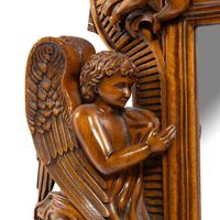 An Italian Baroque Style Carved Walnut Mirror
