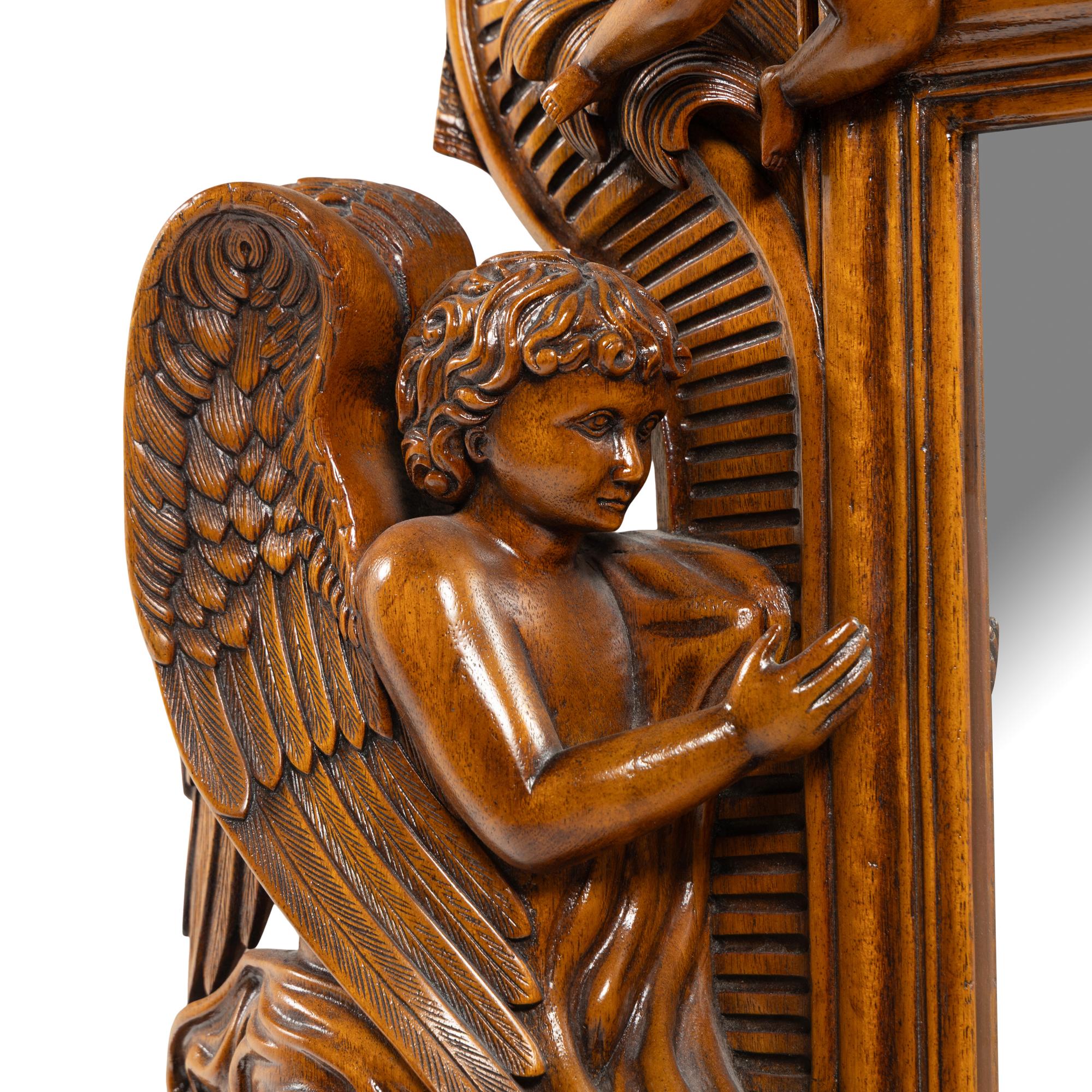 An Italian Baroque Style Carved Walnut Mirror