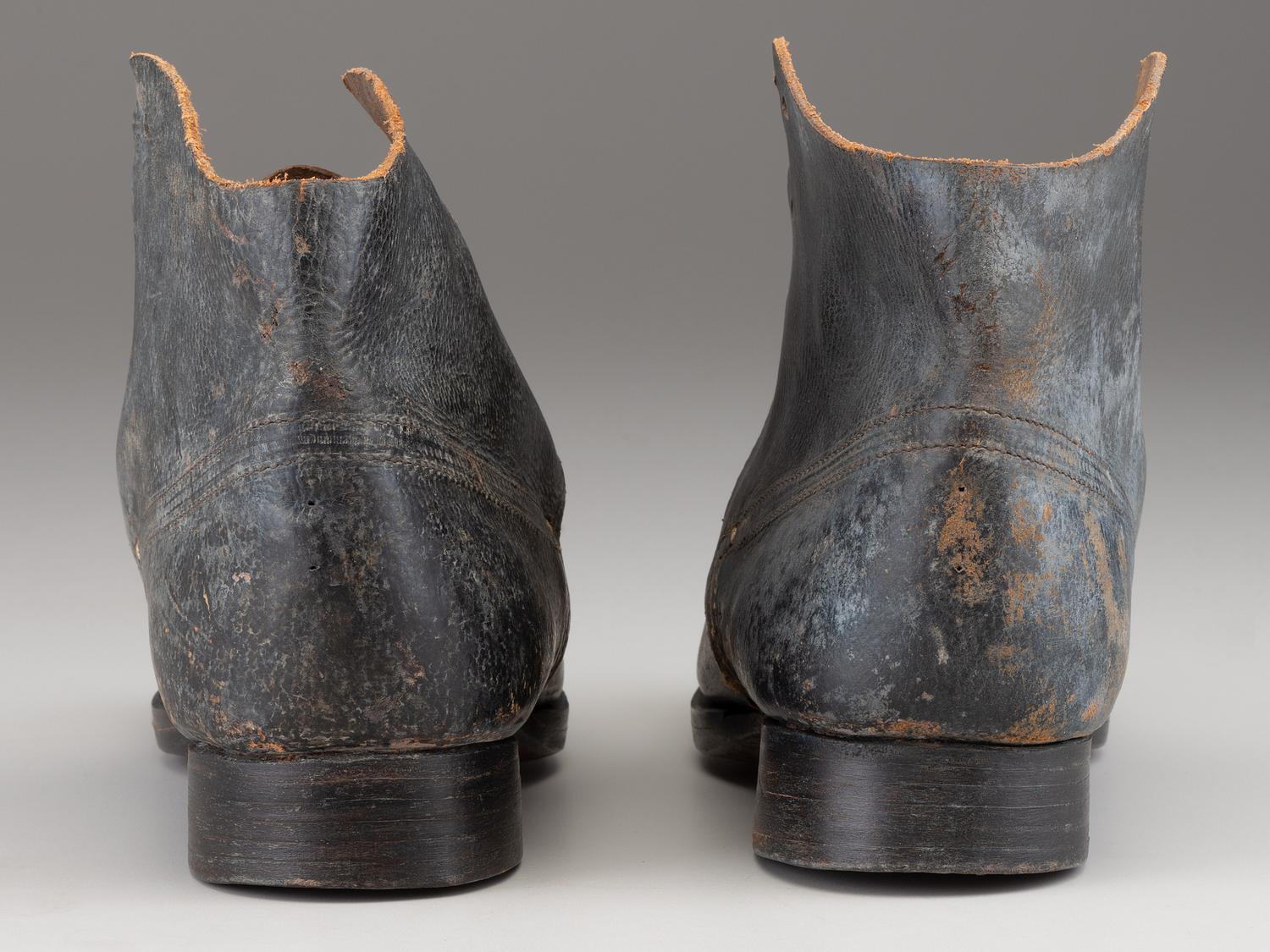 [CIVIL WAR]. A pair of military-issue brogans with a pair of Civil War-period socks.