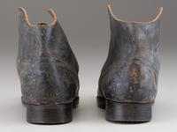 [CIVIL WAR]. A pair of military-issue brogans with a pair of Civil War-period socks.