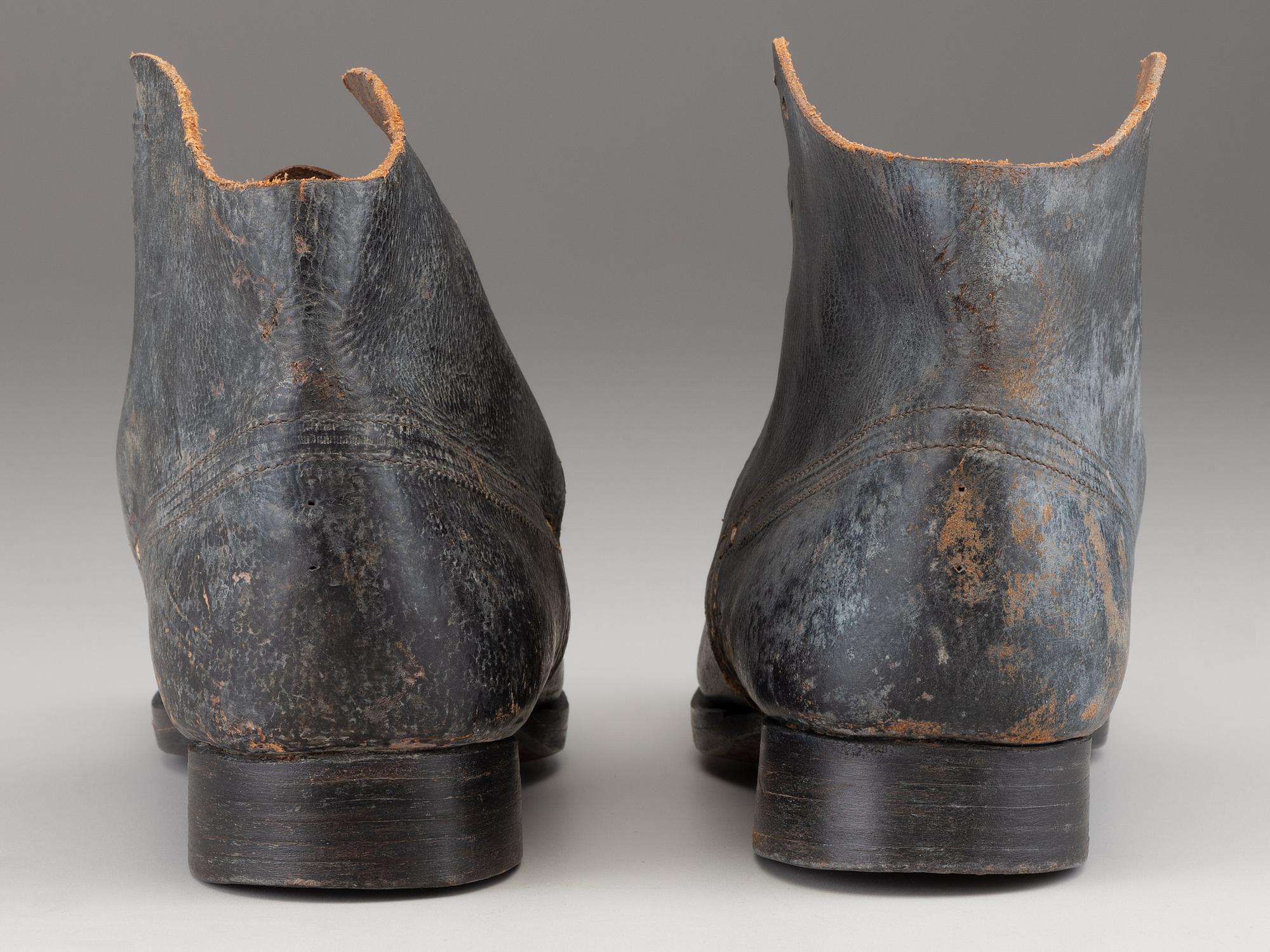 [CIVIL WAR]. A pair of military-issue brogans with a pair of Civil War-period socks.