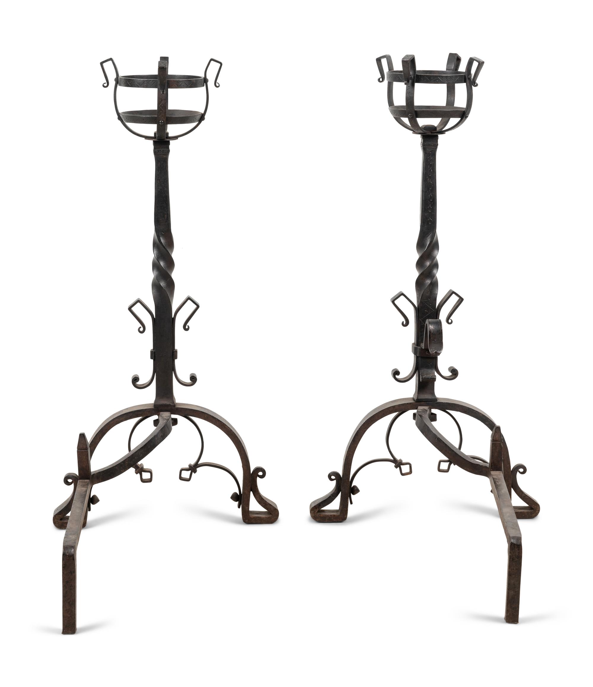 A Pair of Continental Iron Andirons