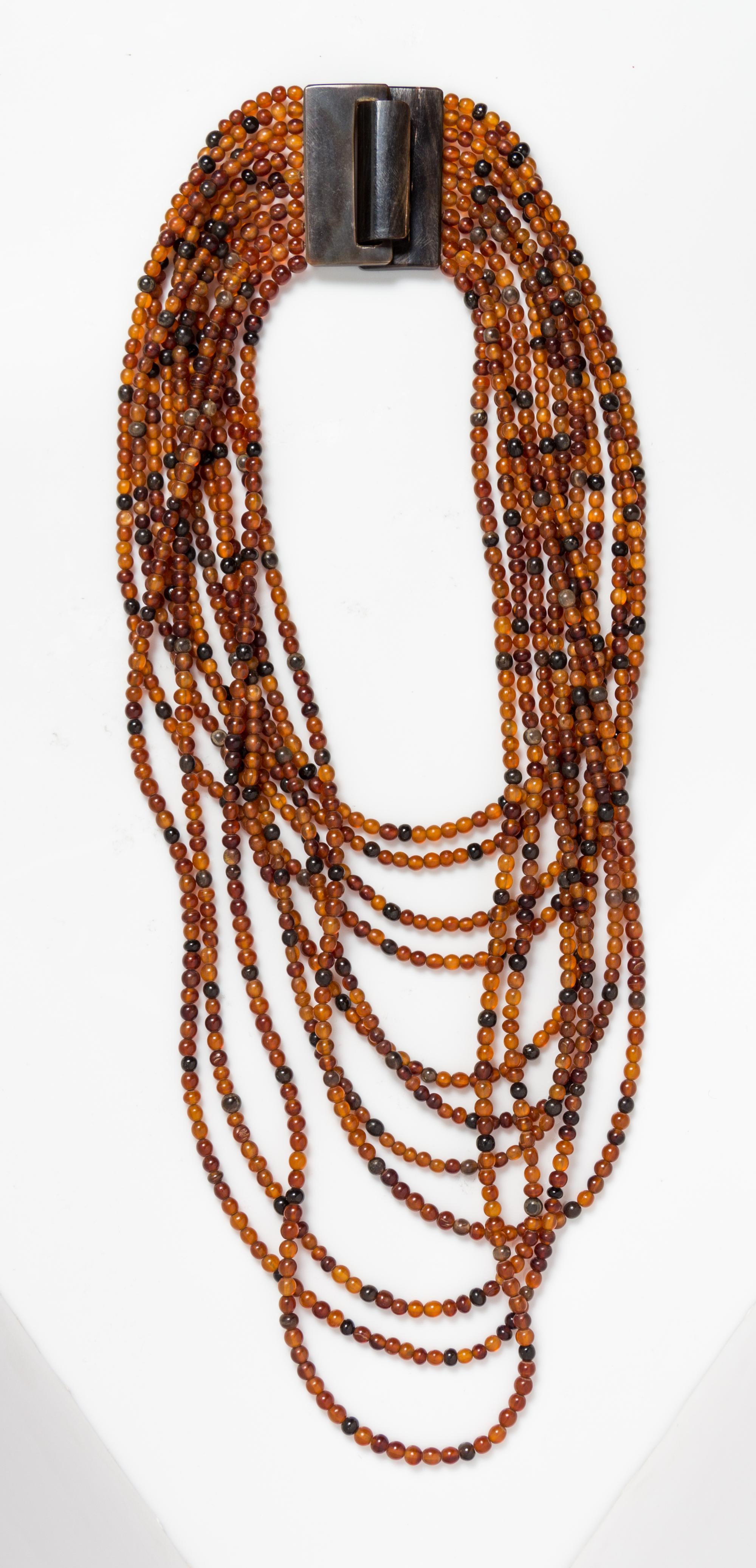 Group of Three Gerda Lynggaard for Monies Multistrand Amber Beaded Necklaces,