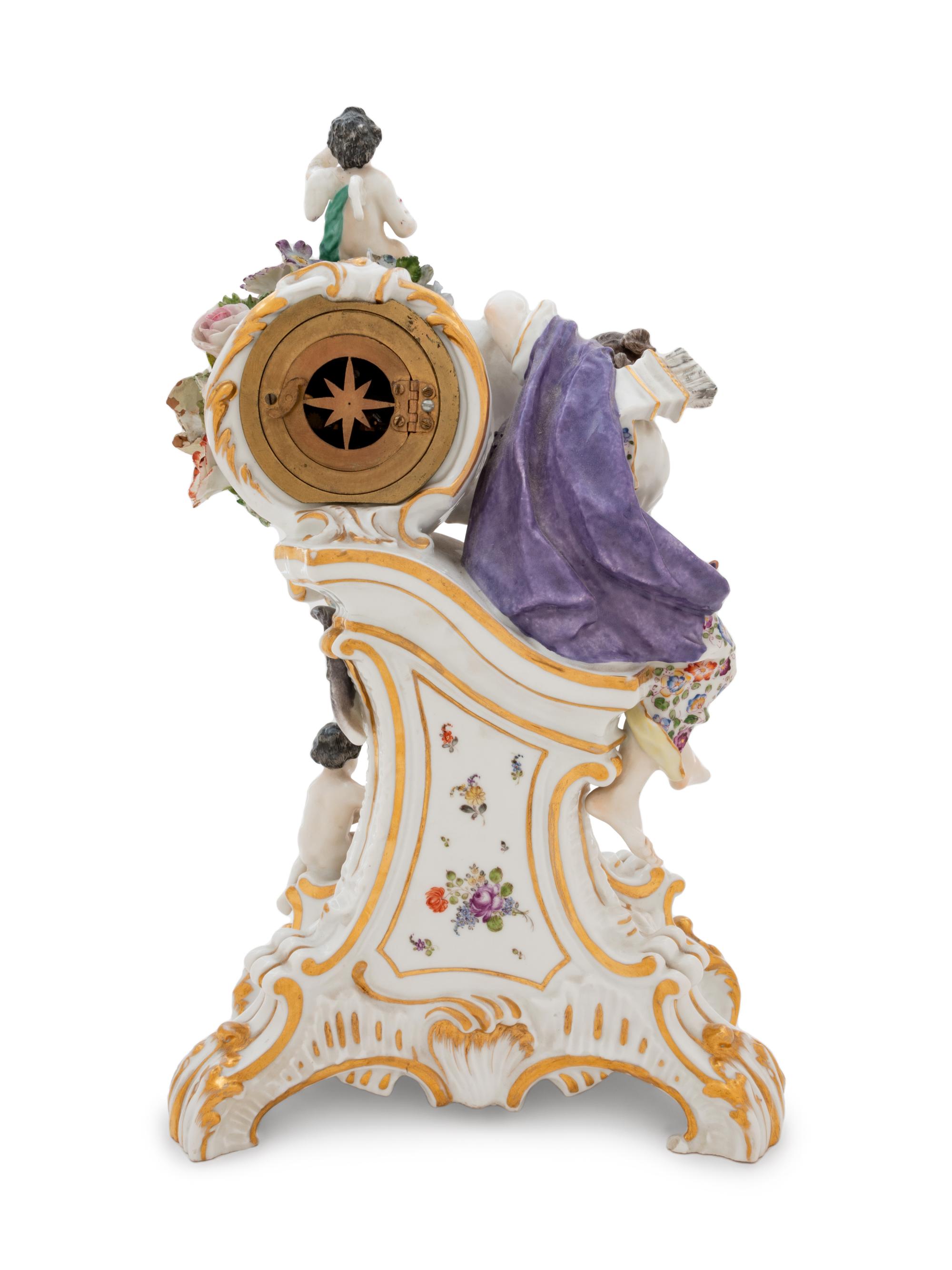 A German Painted and Parcel Gilt Porcelain Figural Mantel Clock