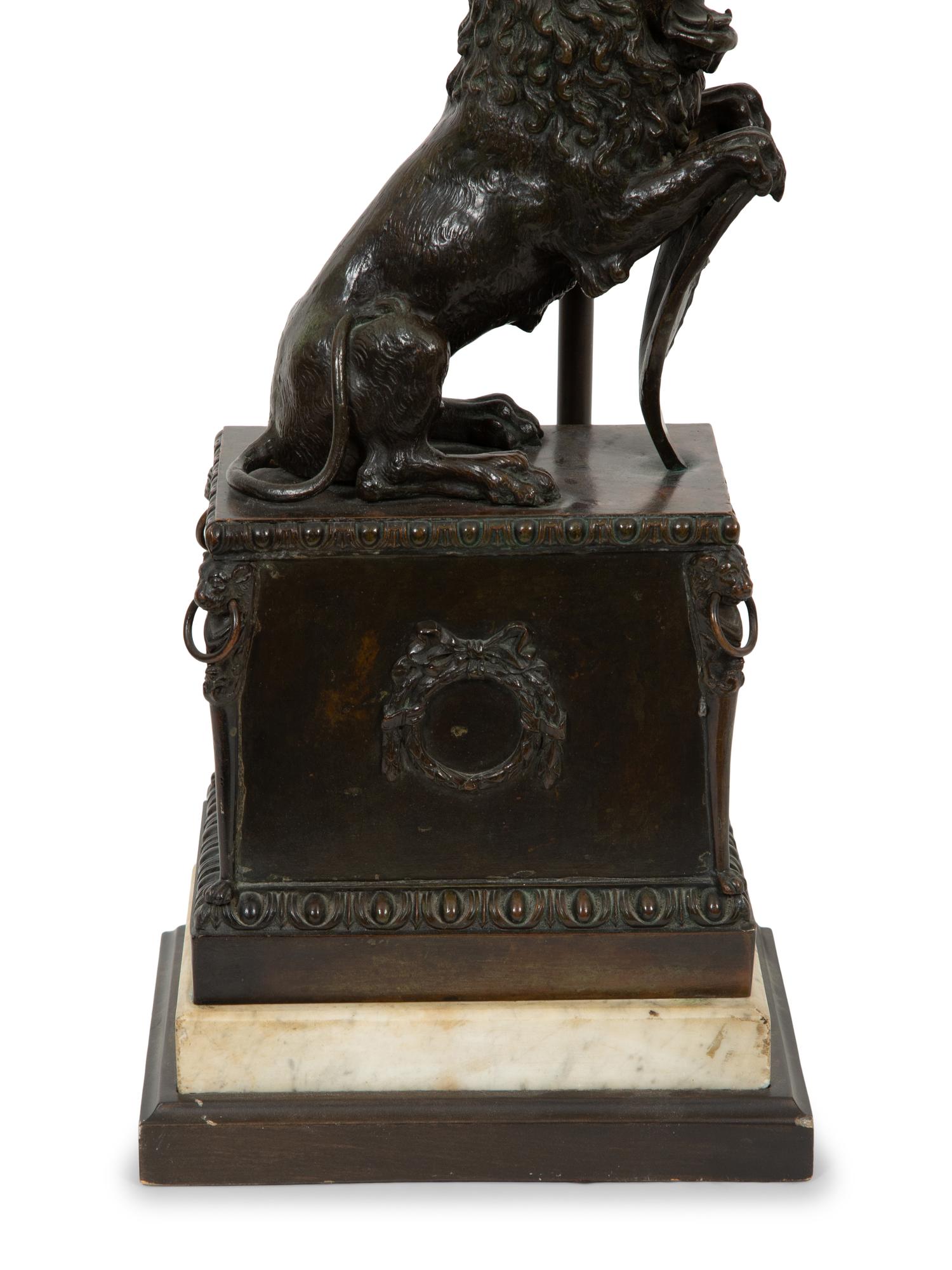 A Continental Bronze Lion and Marble Table Lamp