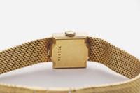 An 18K Yellow Gold Ladies Juvenia Bracelet Watch