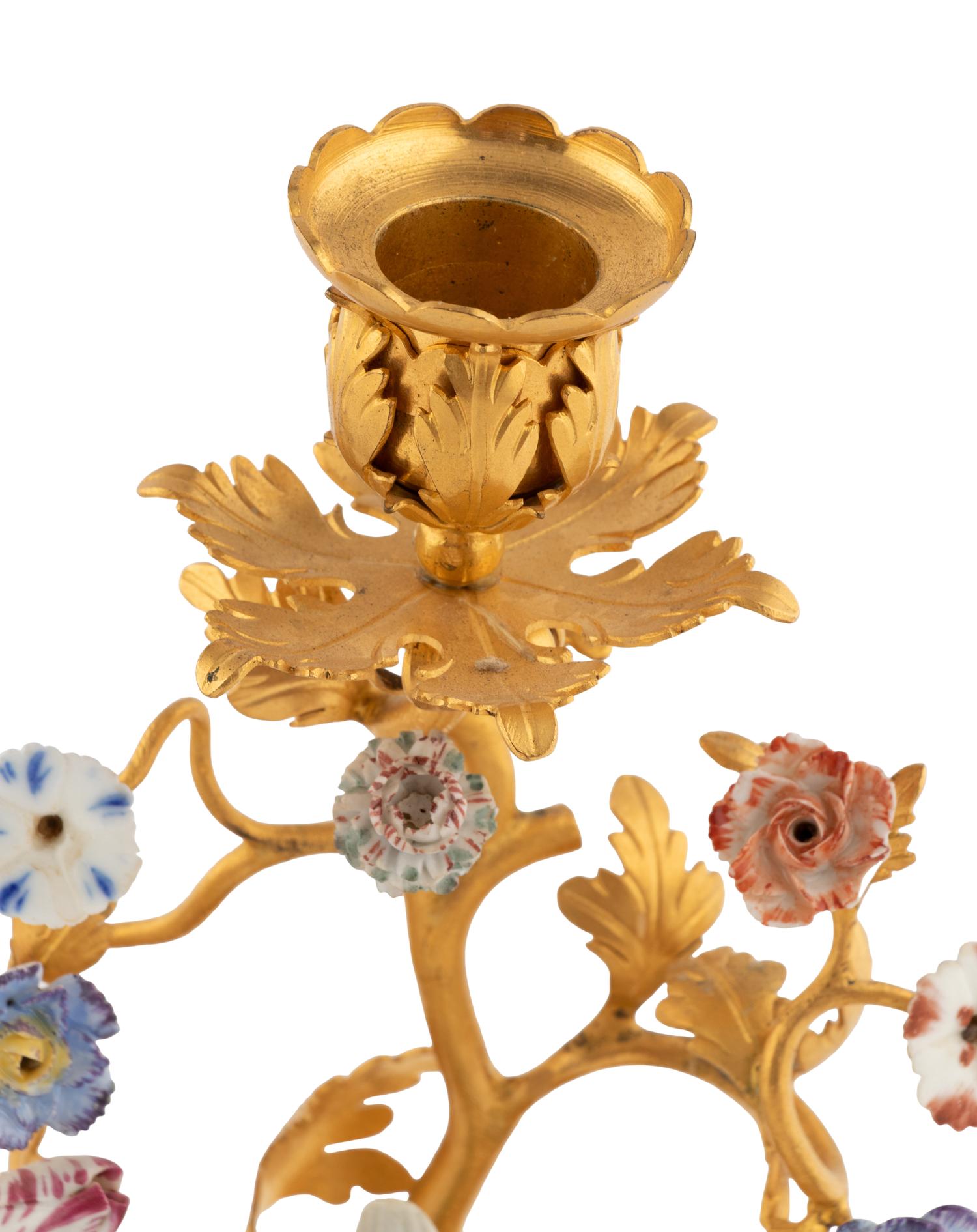 A Pair of French Gilt Bronze and Porcelain Candlesticks
