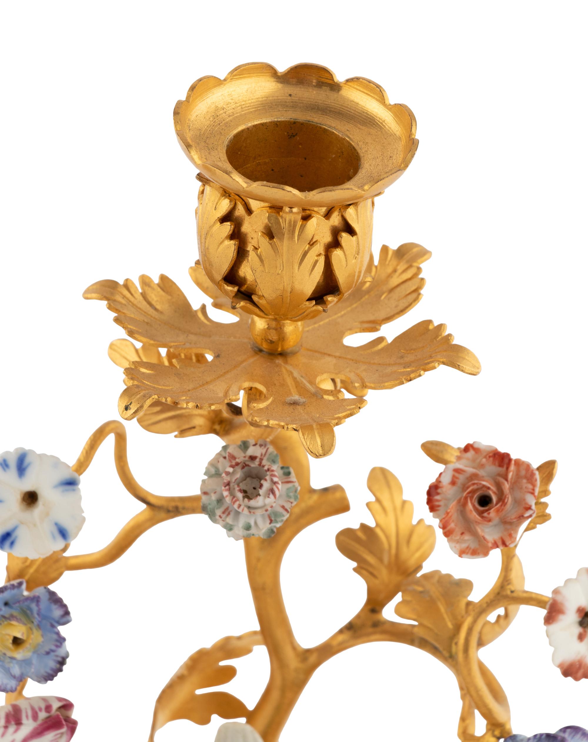 A Pair of French Gilt Bronze and Porcelain Candlesticks
