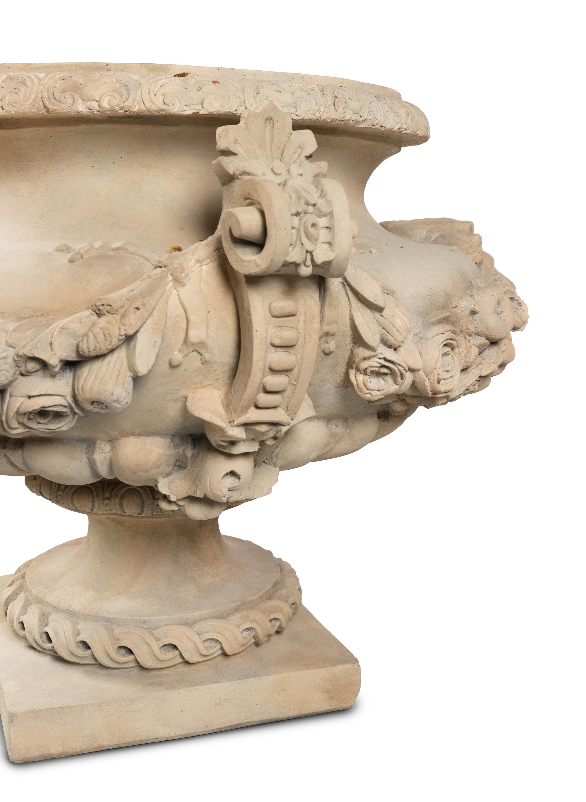 A Pair of Massive Neoclassical Style Terracotta Urns with Plinths