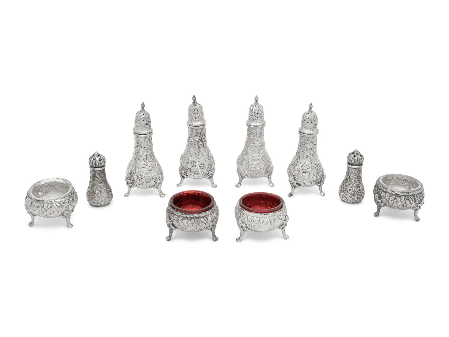 A Collection of S. Kirk and Son Repousse Table Articles