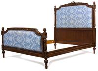 A Louis XVI Style Carved Mahogany Upholstered Headboard and Footboard — 20TH CENTURY