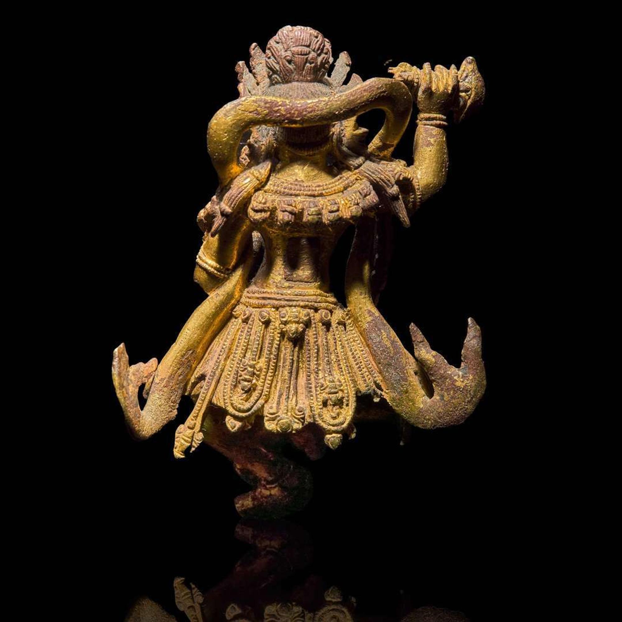 A Tibeto-Chinese or Nepalese gilt bronze figure of a wrathful deity 藏傳佛教銅鎏金造像 15th to 17th century ???????