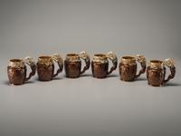 Fifteen Rockingham Glaze Mugs and Pig Banks