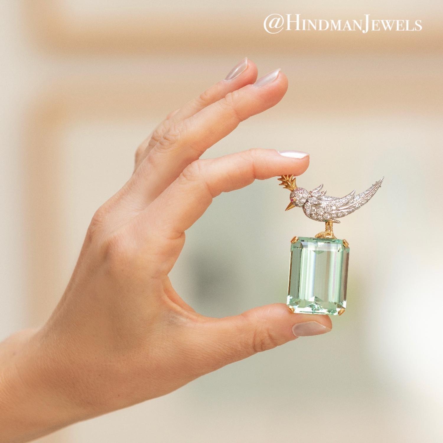 TIFFANY & CO., SCHLUMBERGER, GREEN BERYL AND DIAMOND 'BIRD ON A ROCK' BROOCH
