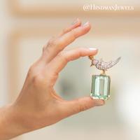 TIFFANY & CO., SCHLUMBERGER, GREEN BERYL AND DIAMOND 'BIRD ON A ROCK' BROOCH