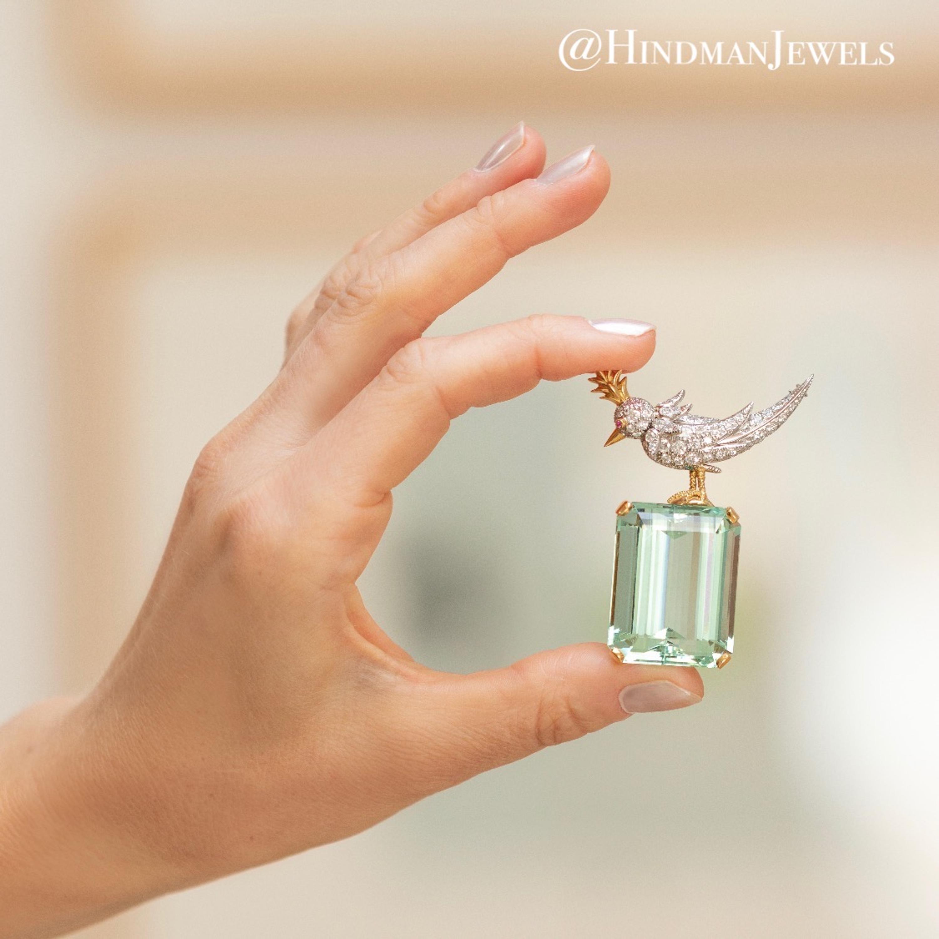 TIFFANY & CO., SCHLUMBERGER, GREEN BERYL AND DIAMOND 'BIRD ON A ROCK' BROOCH